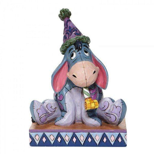 Enesco Disney Figurine Birthday Blues - Eeyore with Birthday Hat Figurine 6008074